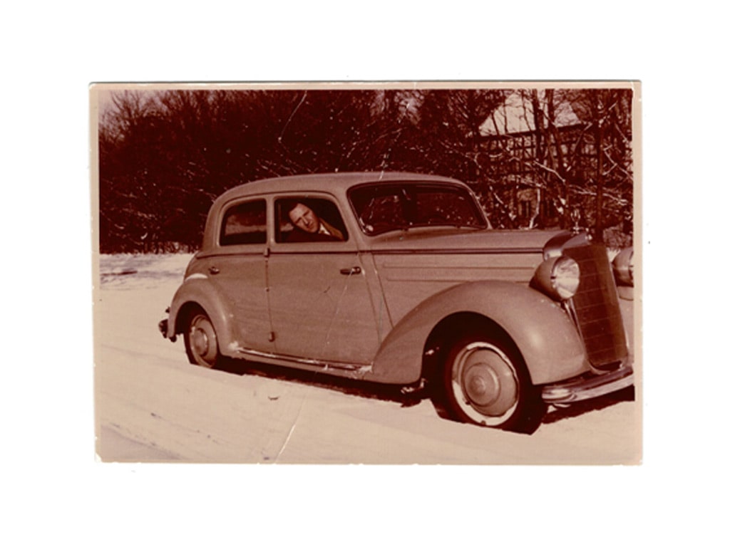 Paul Rathmann in seinem ersten Geschäftswagen